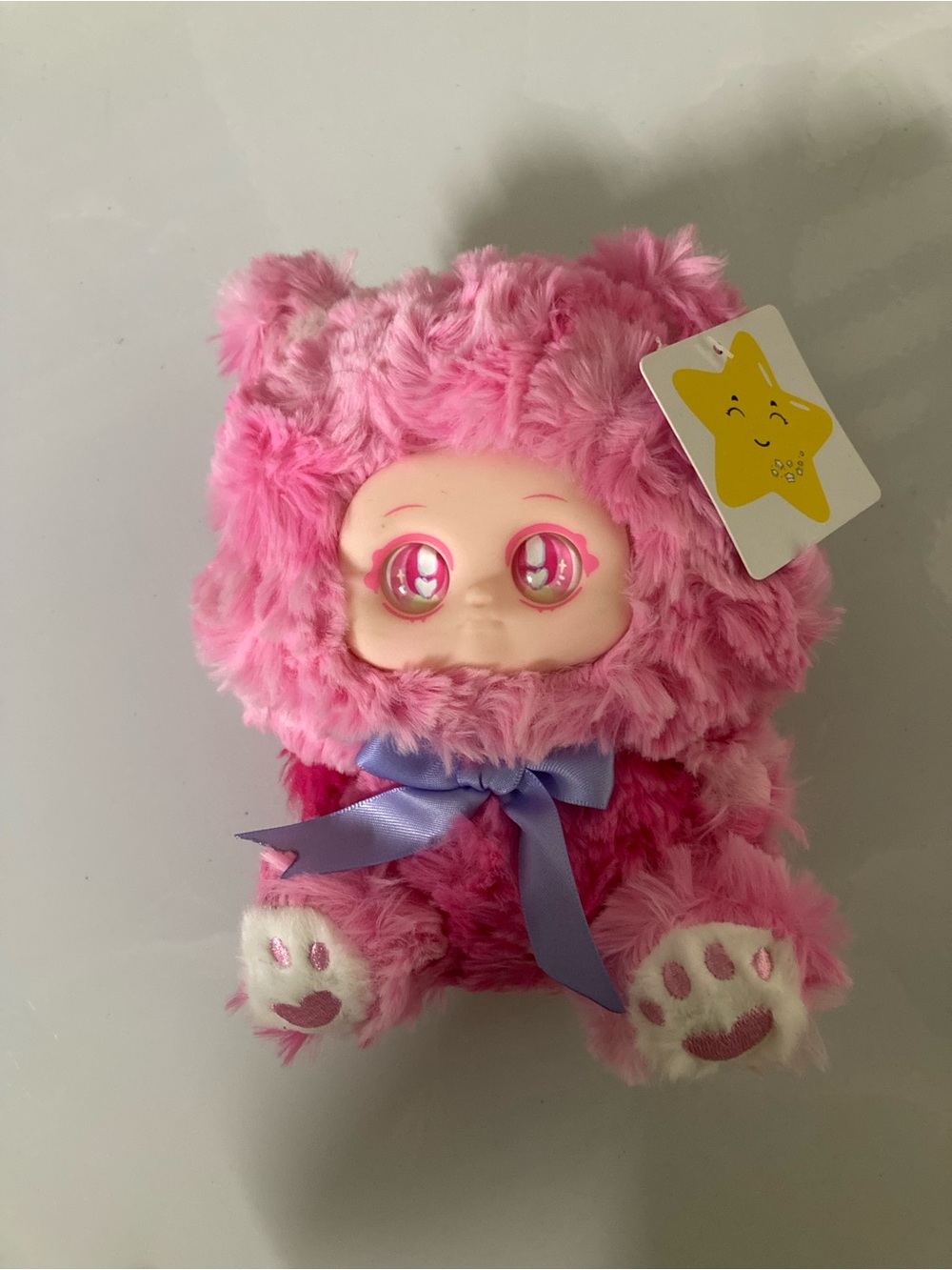 Plush Pink Fuzzy Character Toy with Ribbon Bow
